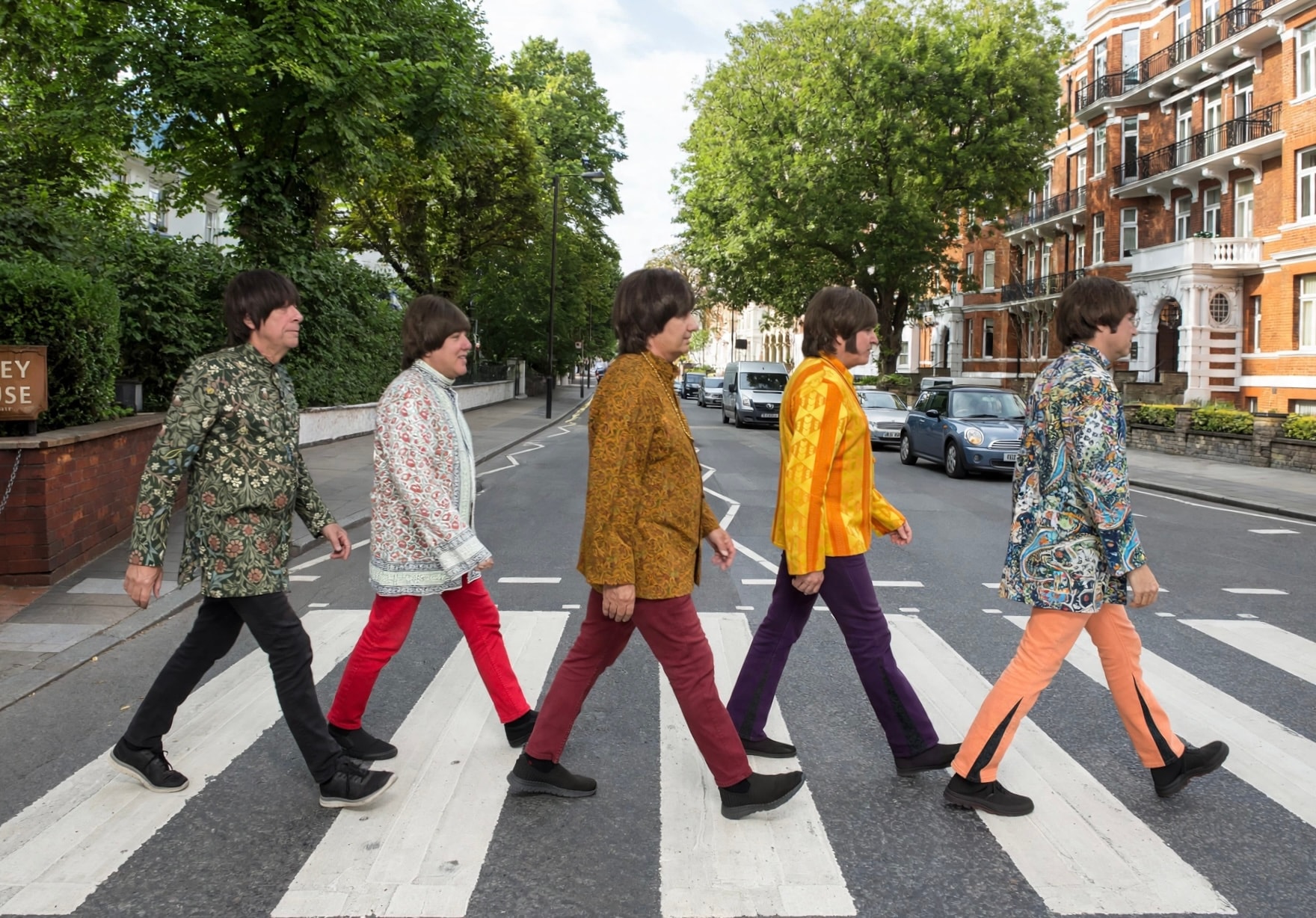 The Fab 5 crossing Abbey Road in colorful 1960s outfits